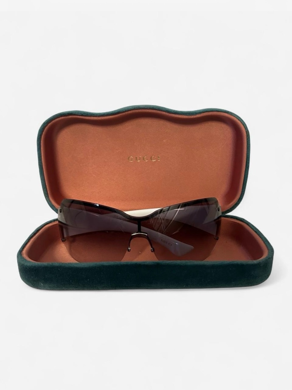 Gucci shield sunglasses with monogram arms
